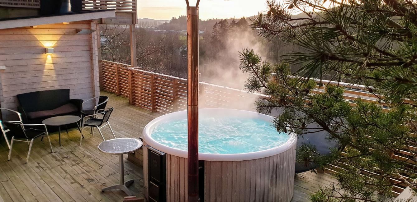 with wood-fired sauna and hot tub and magical views
